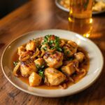 Pollo alla birra con cipolle caramellate
